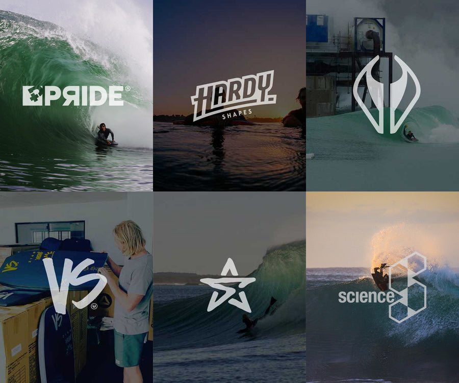 Pared de tablas de bodyboard de diferentes marcas y colores