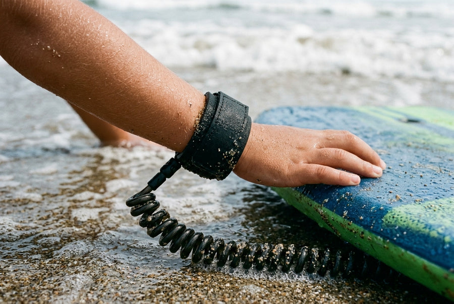 Bodyboard leash attached to a child's wrist, close-up